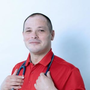 Smiling man with a stethoscope.